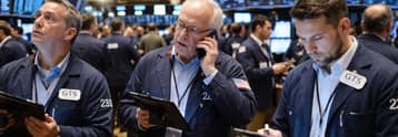 Dow slips as Nasdaq jumps after weak jobs data cools Fed rate hike bets